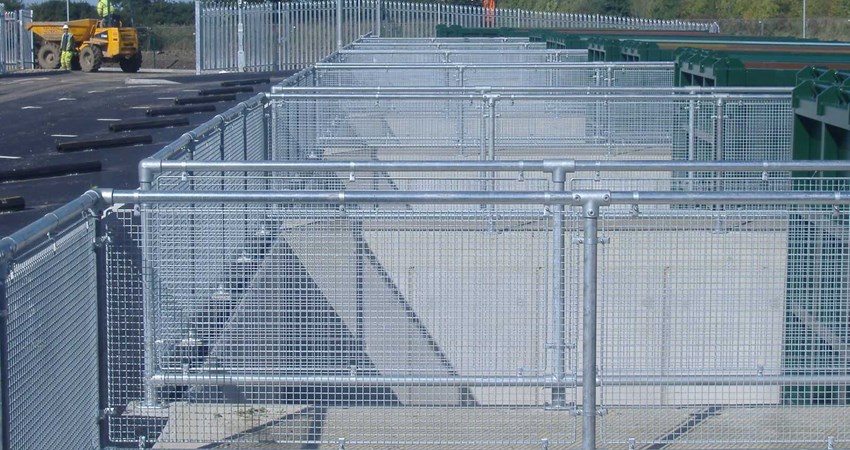 Kee Klamp railing with infill panels for queues