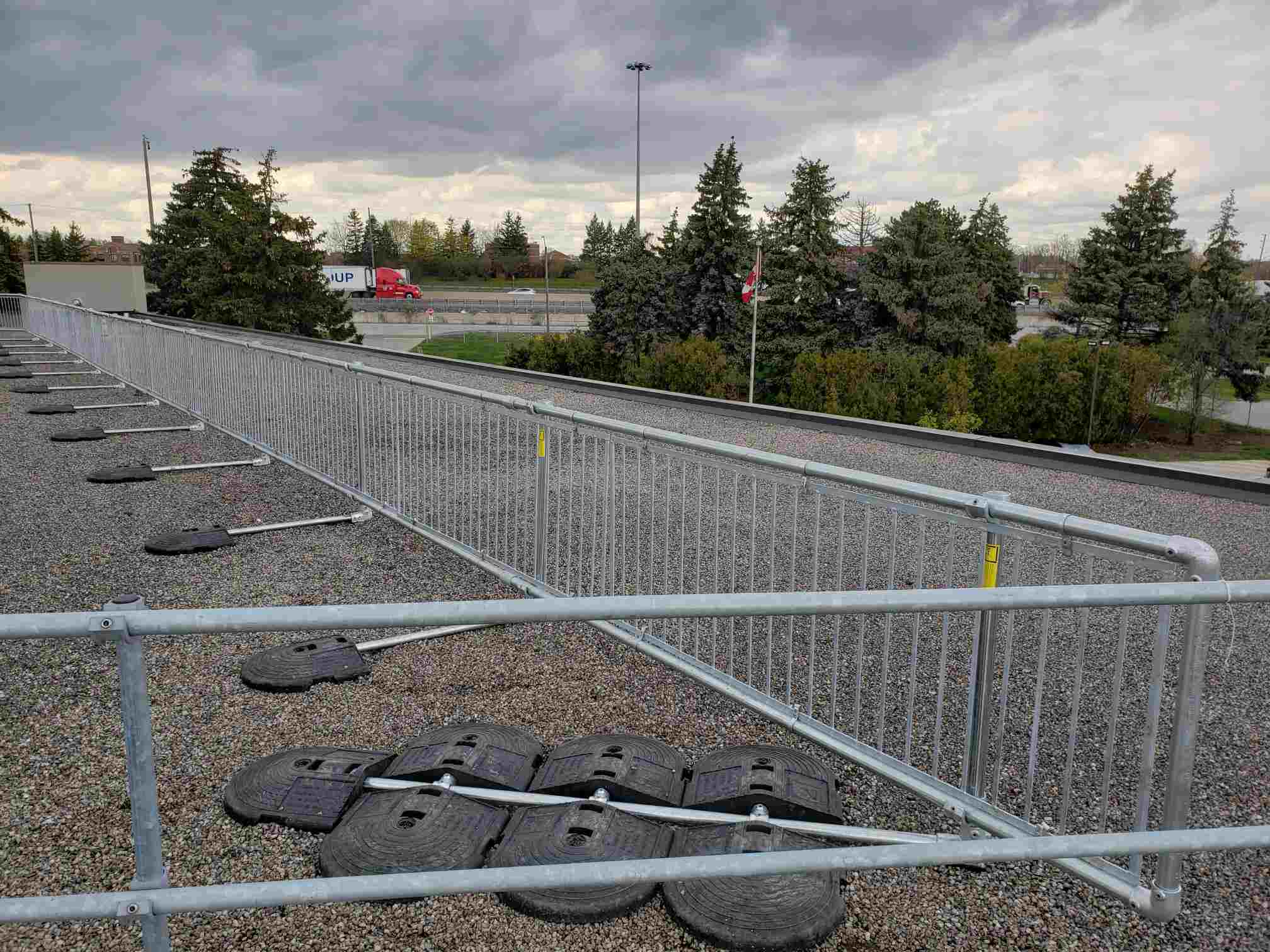 Modular roof edge protection with Kee Guard safety guardrails on a flat roof